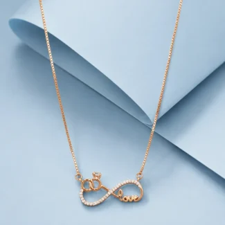 Rose gold infinity love pendant necklace with zircon detailing displayed on a soft pastel blue luxury background.