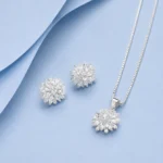 92.5 Sterling Silver Crystal Bloom Pendant Necklace with Matching Floral Stud Earrings featuring Premium Cubic Zirconia Stones